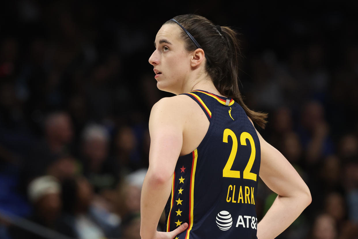 ARLINGTON, TEXAS - MAY 03: Caitlin Clark #22 of the Indiana Fever looks on while playing the Dallas Wings during a pre season game at College Park Center on May 03, 2024 in Arlington, Texas.  (Photo by Gregory Shamus/Getty Images)