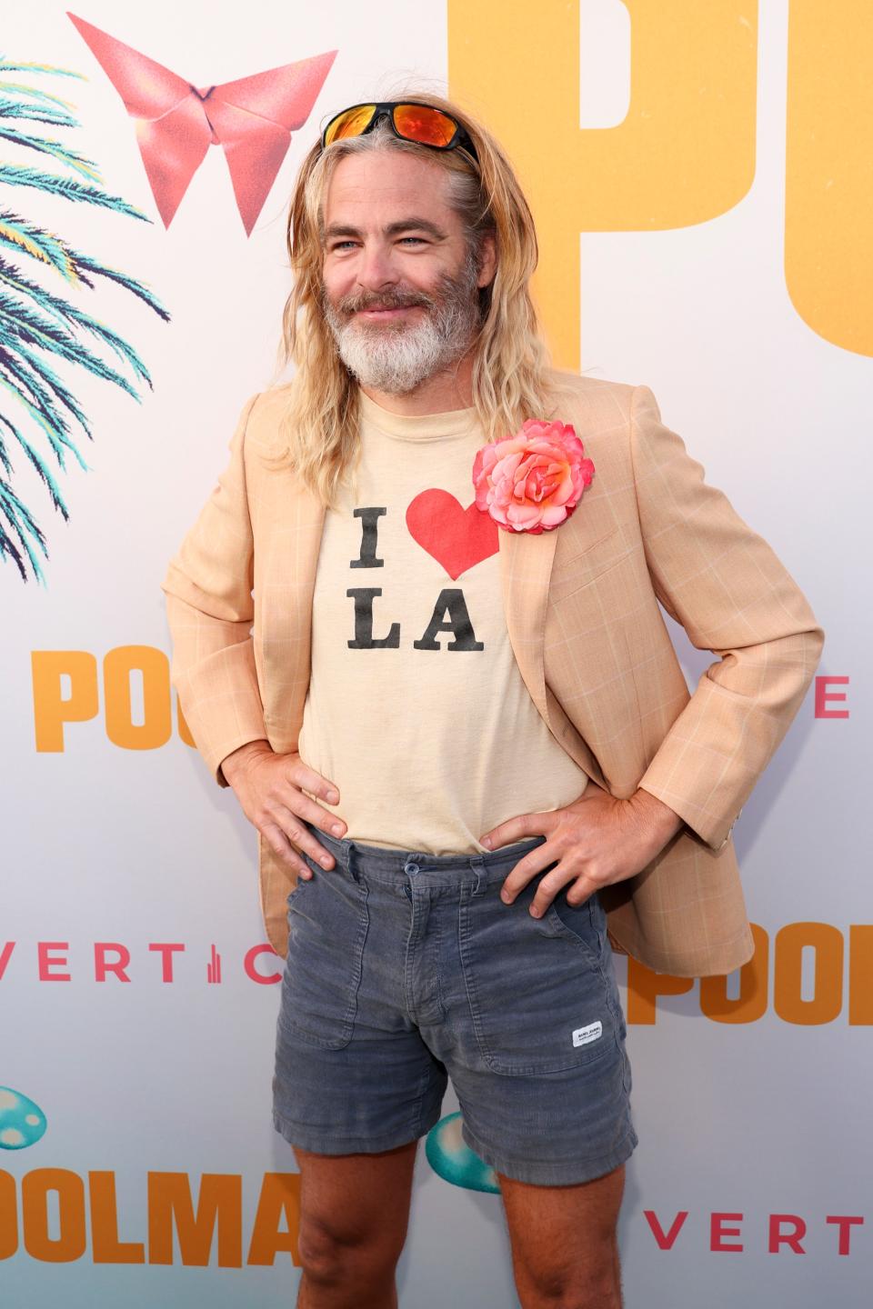 <h1 class="title">Chris Pine Poolman Premiere Long Blonde Hair</h1><cite class="credit">Getty Images</cite>