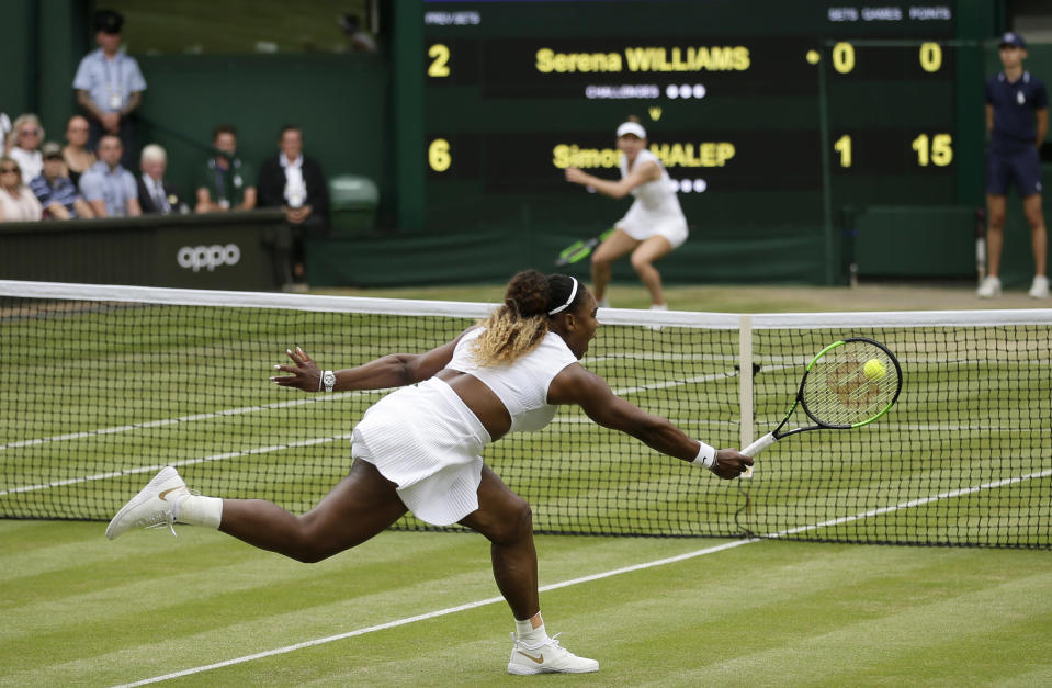 FILE - Serena Williams returns the ball to Romania's Simona Halep, background, during the women's singles final match on day twelve of the Wimbledon Tennis Championships in London, Saturday, July 13, 2019. The singles draw for 2022 Wimbledon is Friday, June 24, 2022. (AP Photo/Tim Ireland, File)