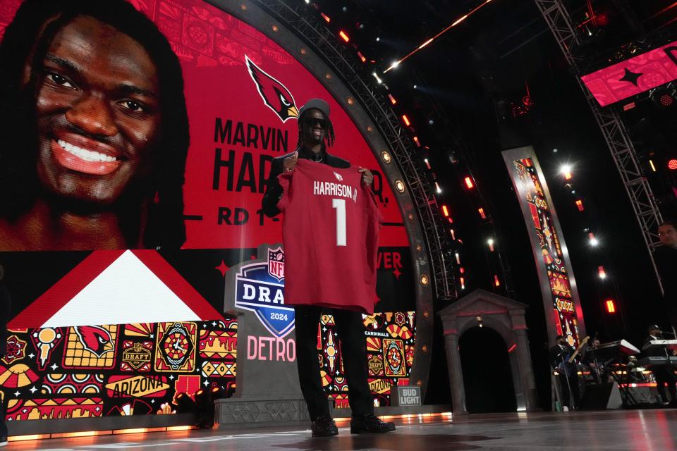 Apr 25, 2024; Detroit, MI, USA; Ohio State Buckeyes wide receiver Marvin Harrison Jr. poses after being selected by the Arizona Cardinals as the No. 4 pick in the first round of the 2024 NFL Draft at Campus Martius Park and Hart Plaza. Mandatory Credit: Kirby Lee-USA TODAY Sports