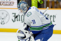 Vancouver Canucks goaltender Arturs Silovs (31) warms up before the start of Game 4 against the Nashville Predators in an NHL hockey Stanley Cup first-round playoff series Sunday, April 28, 2024, in Nashville, Tenn. (AP Photo/George Walker IV)