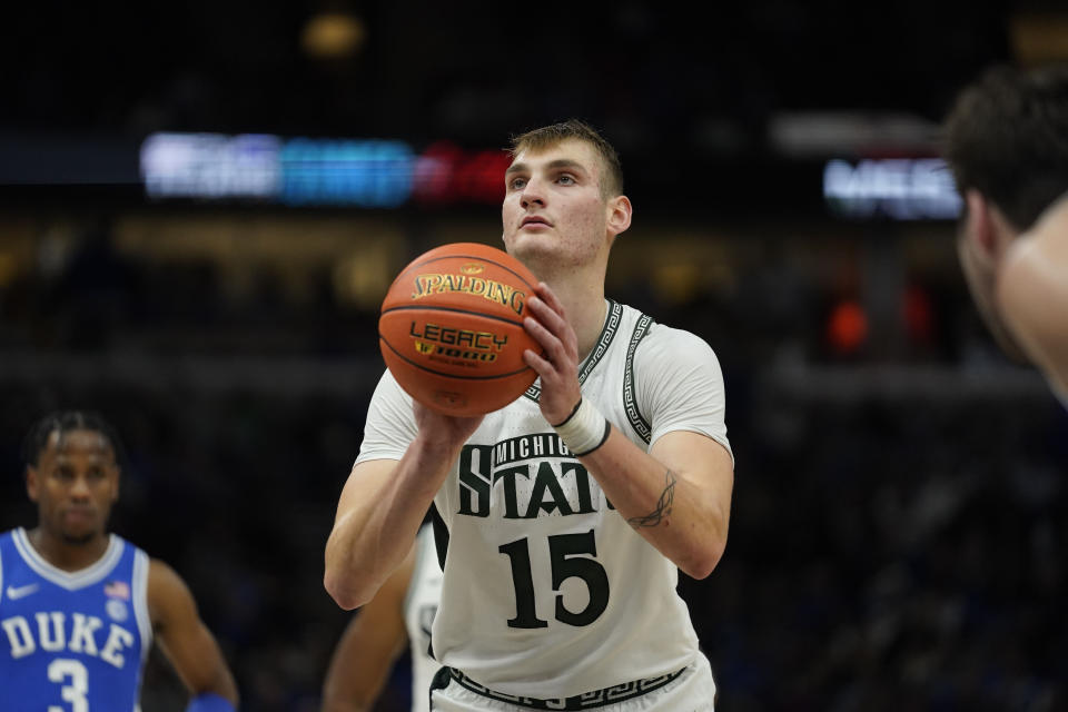Michigan State center Carson Cooper takes a free throw during the second half of an NCAA college basketball game against Duke, Tuesday, Nov. 14, 2023, in Chicago. (AP Photo Erin Hooley)