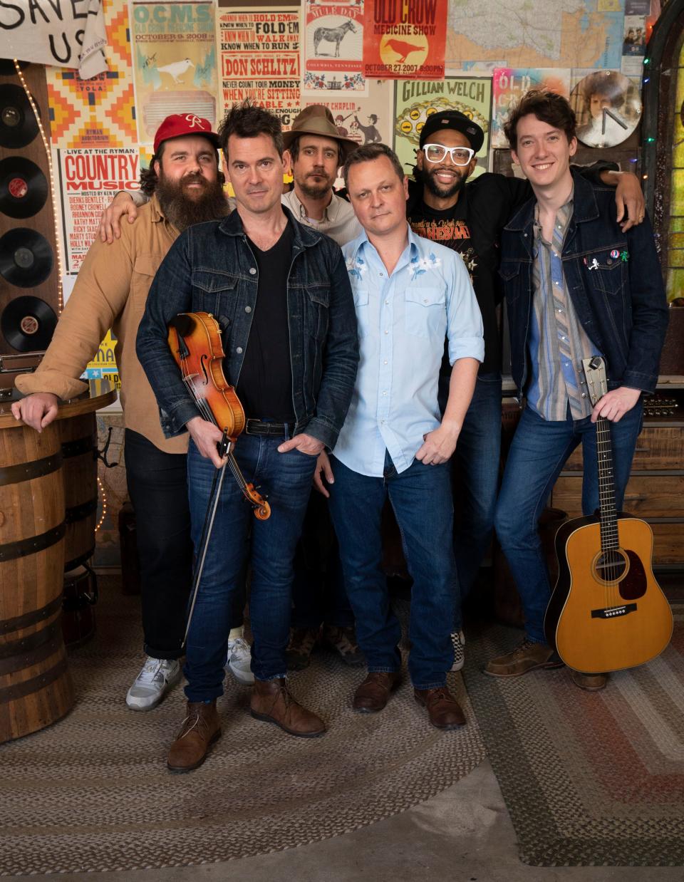 Old Crow Medicine Show members Mike Harris, Ketch Secor, Corry Younts, Morgan Jahnig, Jerry Pentecost and Mason Via pose for a portrait Thursday, April 7, 2022, in Nashville, Tenn.