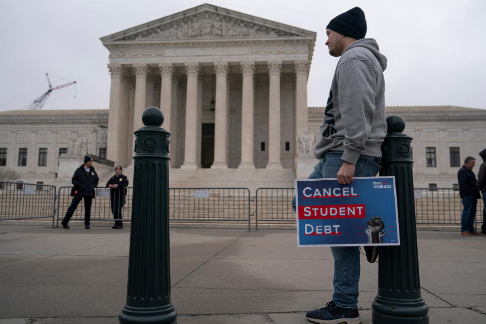 Jordan Crowe, a supporter of student loan debt relief, rallies in front of the Supreme Court as the justices are scheduled to hear oral arguments in two cases involving President Joe Biden&#39;s bid to reinstate his plan to cancel billions of dollars in student debt in Washington, U.S., February 28, 2023. REUTERS/Nathan Howard