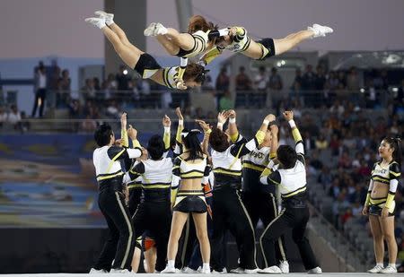 Cheerleaders perform during the opening ceremony of the 17th Asian Games in Incheon September 19, 2014. REUTERS/Jason Reed