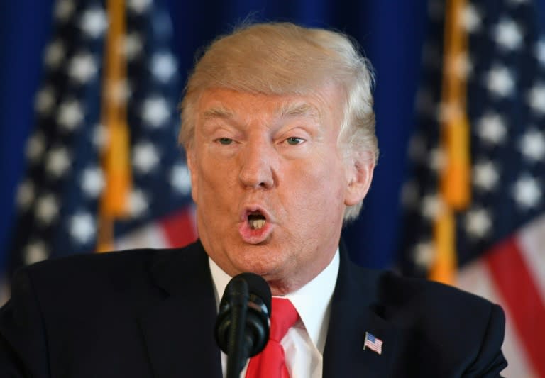 US President Donald Trump speaks to the press about protests in Charlottesville on August 12, 2017, at Trump National Golf Club in Bedminster, New Jersey