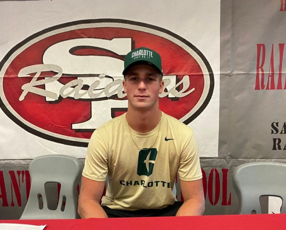 Santa Fe senior Connor Wetherington signed a track and field scholarship with UNC-Charlotte on May 23 at Santa Fe High School.