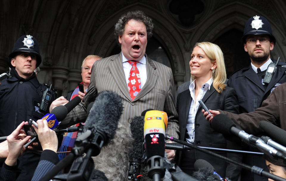 FILE - In this Thursday, Dec. 16, 2010 file photo, human rights lawyer Mark Stephens, delivers a statement to the media on his client, WikiLeaks founder Julian Assange, outside the High Court, London. Stephens, in a public lecture and an opinion piece in the Guardian newspaper, has called on the International Olympic Committee to ban the roughly 75 countries that outlaw homosexual activity. That demand has prompted several human rights organizations to say the IOC should at least speak out, even if a ban at this stage is unrealistic. (AP Photo/Adrian Dennis, Pool)