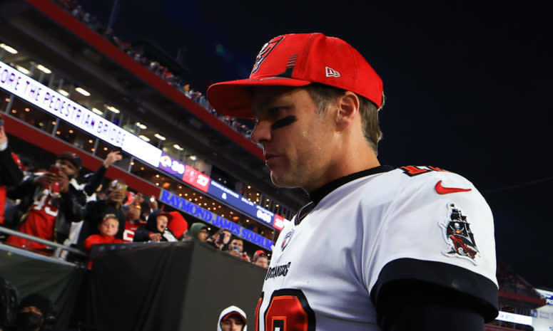 Tampa Bay Buccaneers quarterback Tom Brady walks to the locker room.