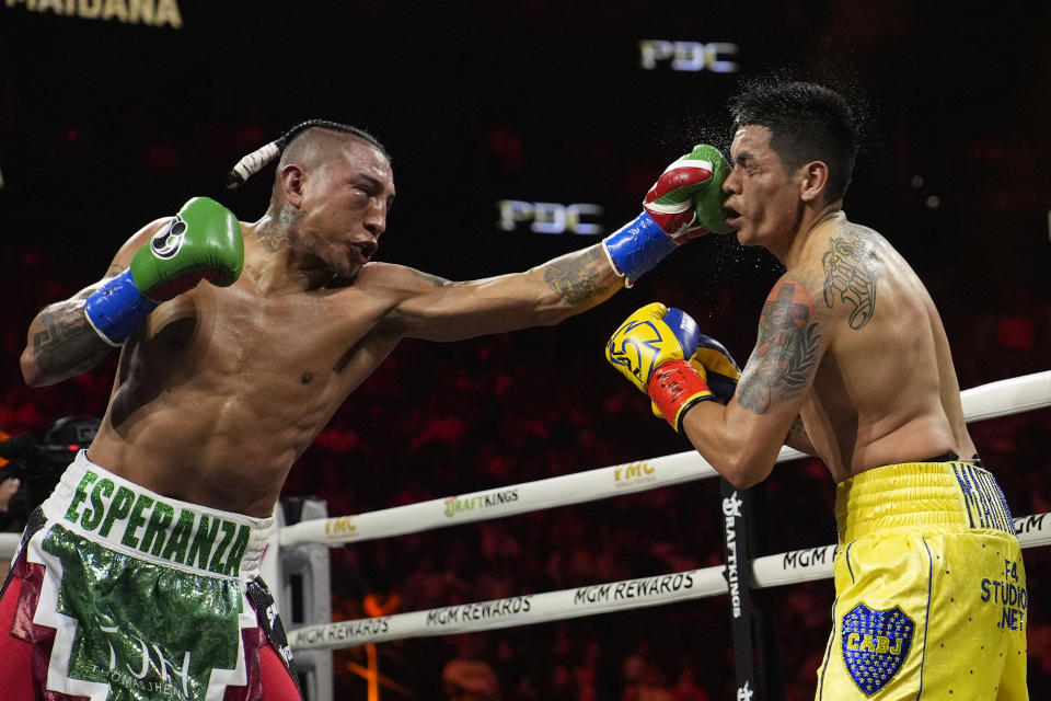 Mario Barrios lands a left to Fabian Maidana in a welterweight title fight Saturday, May 4, 2024, in Las Vegas. (AP Photo/John Locher)