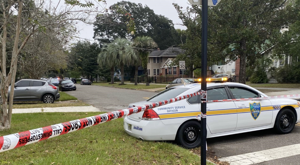 Police block Ernest Street in Jacksonville's Riverside neighborhood where officers killed a murder suspect trying to evade arrest Tuesday.