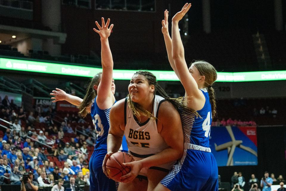 Bishop Garrigan's Audi Crooks (55) drive to the hoop during the Class 1A Iowa girls state basketball championship between Newell-Fonda and Bishop Garrigan, on Saturday, March 4, 2023, at Wells Fargo Arena in Des Moines.