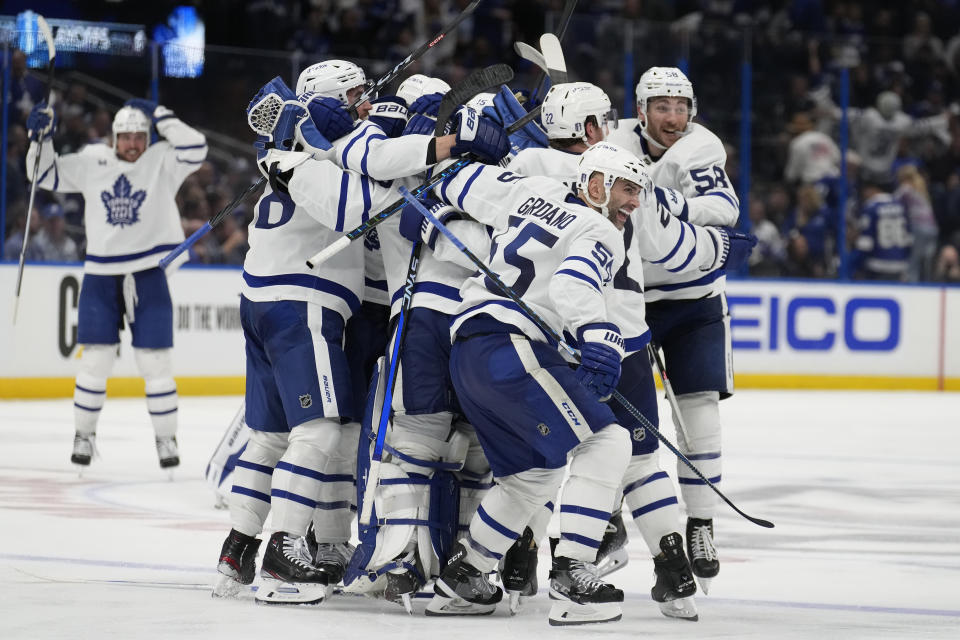 The Toronto Maple Leafs celebrate after the team defeated the Tampa Bay Lightning during overtime in Game 6 of an NHL hockey Stanley Cup first-round playoff series Saturday, April 29, 2023, in Tampa, Fla. (AP Photo/Chris O'Meara)