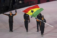 <p>Akwasi Frimpong carries the flag of Ghana during the opening ceremony of the 2018 Winter Olympics in Pyeongchang, South Korea, Friday, Feb. 9, 2018. (AP Photo/Michael Sohn) </p>