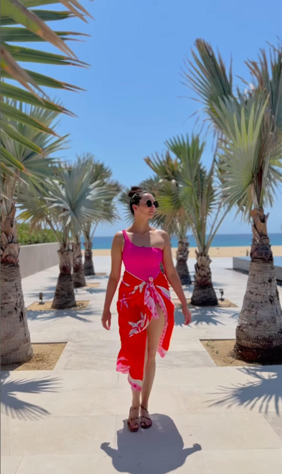 Ricki-Lee Coulter in a pink swimsuit in Cabo