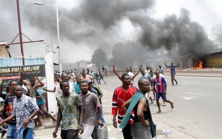 Congolese opposition supporters chant slogans during a march to press President Joseph Kabila to step down in the Democratic Republic of Congo's capital Kinshasa. REUTERS/Kenny Katombe