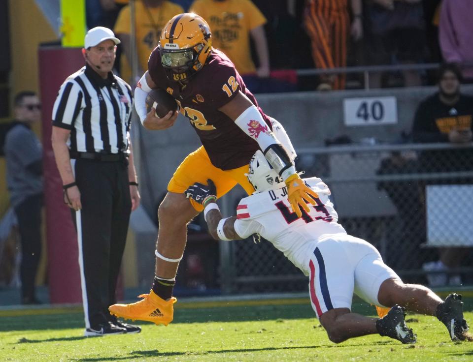 Nov 25, 2023; Tempe, Arizona, USA; Arizona State tight end Jalin Conyers (12) is brought down by Arizona safety Dalton Johnson (43) during the second quarter at Mountain America Stadium. Mandatory Credit: Michael Chow-Arizona Republic