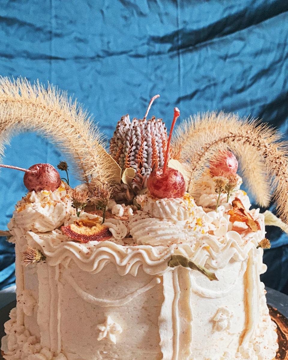 Blood orange and dark chocolate sponge cake with a coffee-coconut-chestnut cream filling and cardamom- and cinnamon-spiced Swiss meringue