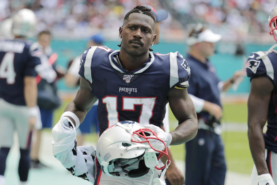 FILE - In this Sunday, Sept. 15, 2019, file photo, New England Patriots wide receiver Antonio Brown (17) stands on the sidelines during the first half at an NFL football game against the Miami Dolphins in Miami Gardens, Fla. Nike has dropped New England Patriots receiver Antonio Brown, Nike spokesman Josh Benedek told The Associated Press on Friday, Sept. 20, 2019. The move comes after a second woman accused Brown of sexual assault.  (AP Photo/Lynne Sladky, File)