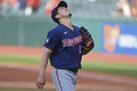 Minnesota Twins starting pitcher Kenta Maeda (18) reacts after giving up a solo home run in the first inning of a baseball game, Tuesday, April 27, 2021, in Cleveland. (AP Photo/David Dermer)