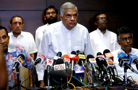 FILE PHOTO: Sri Lanka's ousted Prime Minister Ranil Wickremesinghe arrives at a news conference in Colombo, Sri Lanka October 27, 2018. REUTERS/Dinuka Liyanawatte/File Photo