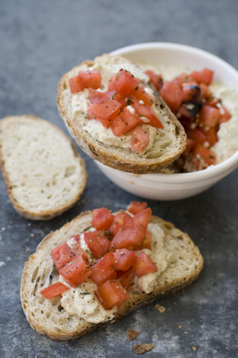 This Sept. 30, 2013 photo shows Italian-style hummus with diced tomatoes in Concord, N.H. (AP Photo/Matthew Mead)