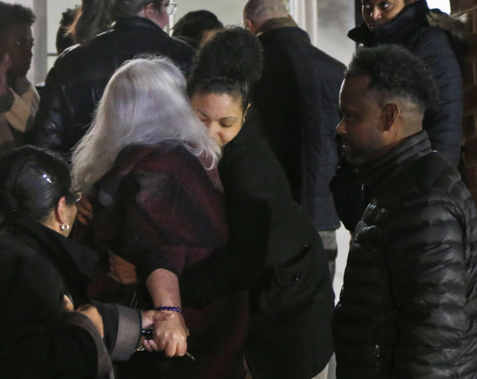 Susan Bro, left, mother of Heather Heyer is hugged by a supporter on the steps of the courthouse after a guilty verdict was reached in the trial of James Alex Fields Jr., Friday, Dec. 7, 2018, at Charlottesville General district court in Charlottesville, Va. Fields was convicted of first degree murder in the death of Heather Heyer as well as nine other counts during a "Unite the Right" rally in Charlottesville . (AP Photo/Steve Helber)