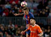 Football Soccer- Spanish La Liga Santander - Barcelona v Osasuna - Camp Nou stadium, Barcelona, Spain - 26/04/17 Barcelona's Denis Suarez (L) and Osasuna's Jaime Romero in action. REUTERS/Albert Gea