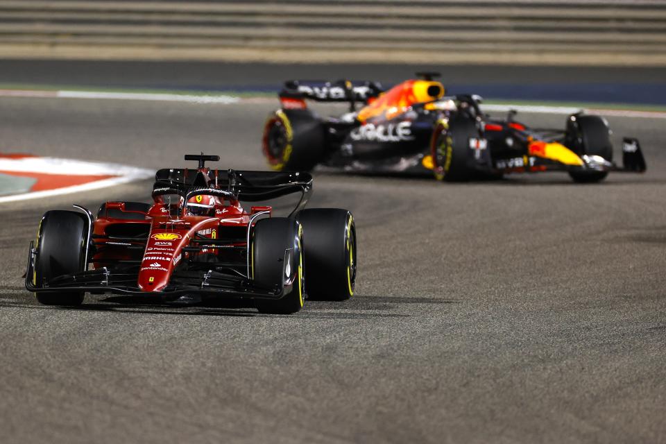 BAHRAIN - (lr) Charles Leclerc (16) driving the Ferrari, Max Verstappen (1) driving the Oracle Red Bull Racing RB18 Honda on track during the Bahrain Formula 1 Grand Prix at the Bahrain International Circuit on March 20, 2022 in Bahrain, Bahrain. ANP ROBIN VAN LONKHUIJSEN (Photo by ANP via Getty Images)