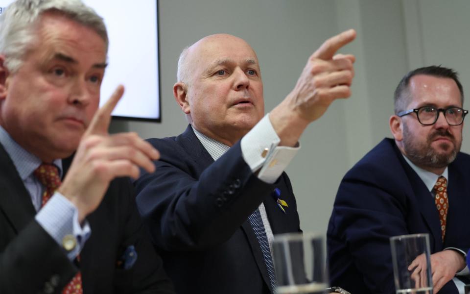 China Inter-Parliamentary Alliance MPs Tim Loughton, Iain Duncan Smith and Stewart McDonald hold a press conference