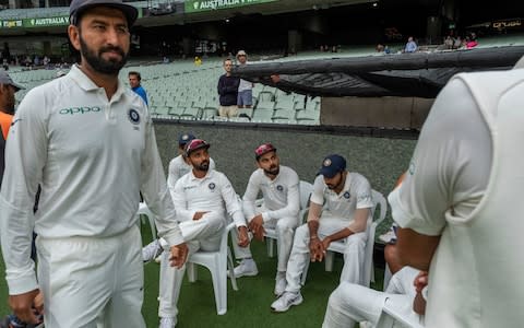 India captured Australia's last two wickets after a rain-delayed start to day five of the third Test on Sunday to complete an emphatic 137-run win and take a 2-1 series lead into the Sydney finale.