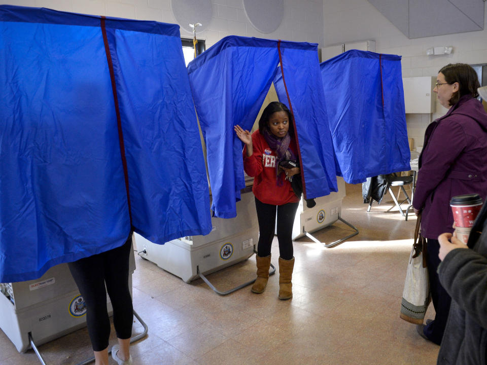 People prepare to cast votes in Philadelphia, Pennsylvania: REUTERS/Charles Mostoller