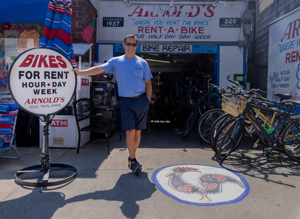 Robb Beaton, owner of Arnold’s Bike Shop in his store Wednesday morning, bought the bike shop from his grandfather in 1998 in Provincetown. Arnold’s Bike Shop has been open since 1937.