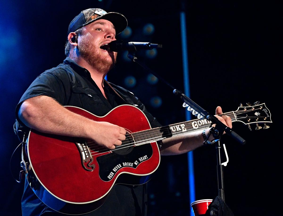 Luke Combs inducted into Grand Ole Opry by Vince Gill 'You can do