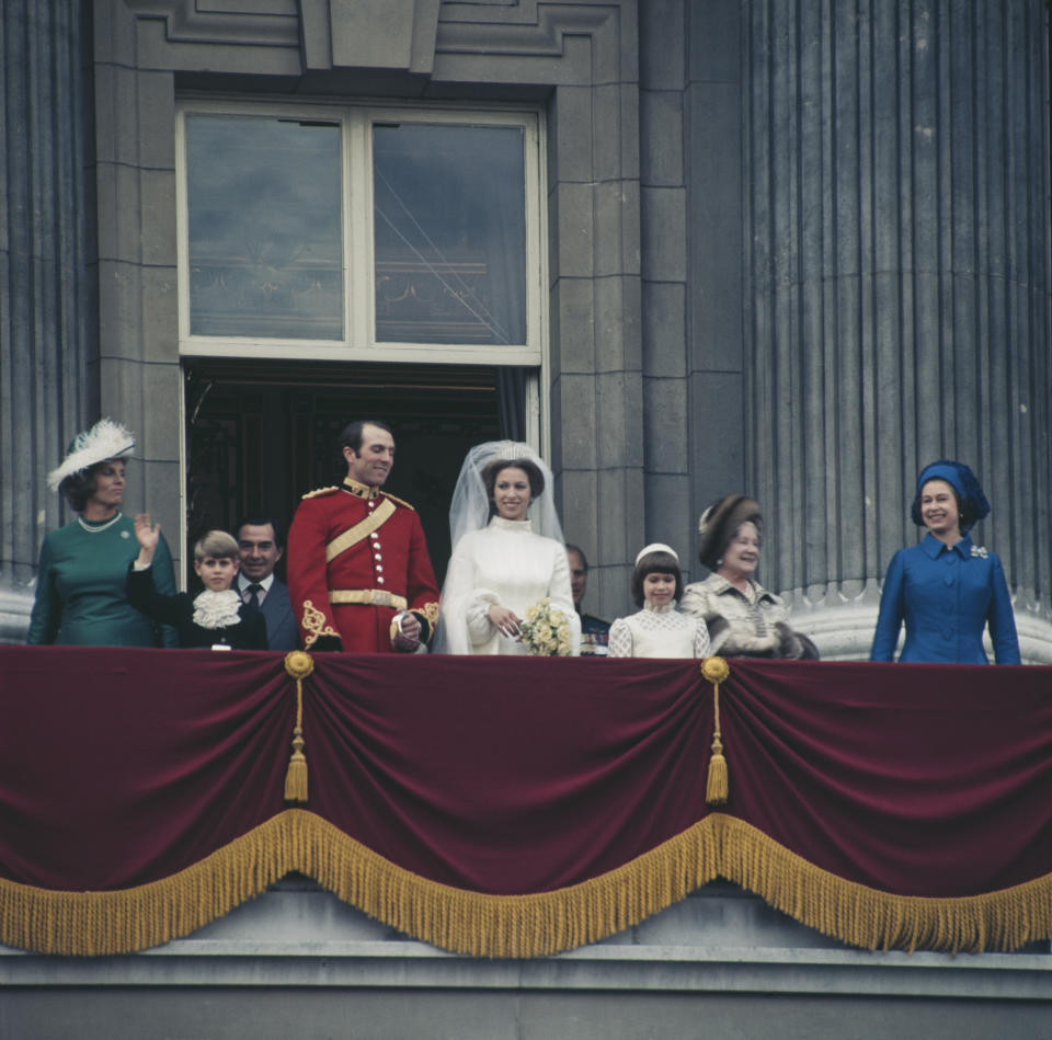 <p>The Queen, far right, on the balcony at Buckingham Palace after the wedding of Princess Anne and Mark Phillips on 14 November 1973. (Getty Images)</p> 