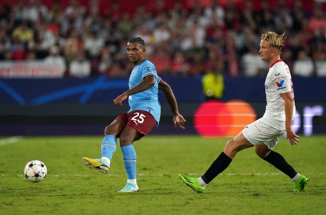 Manuel Akanji (left) made a composed debut