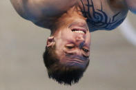 France's Matthieu Rosset performs a dive during the men's 3m springboard preliminary round at the London 2012 Olympic Games at the Aquatics Centre August 6, 2012. REUTERS/Jorge Silva (BRITAIN - Tags: SPORT DIVING OLYMPICS SPORT SWIMMING) 