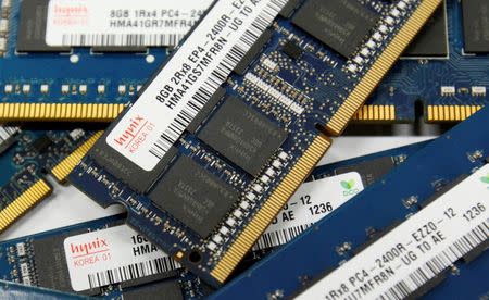 FILE PHOTO: SK Hynix Inc's DRAM modules are seen in this picture illustration taken at the company's main office building in Seoul October 24, 2012. REUTERS/Kim Hong-Ji
