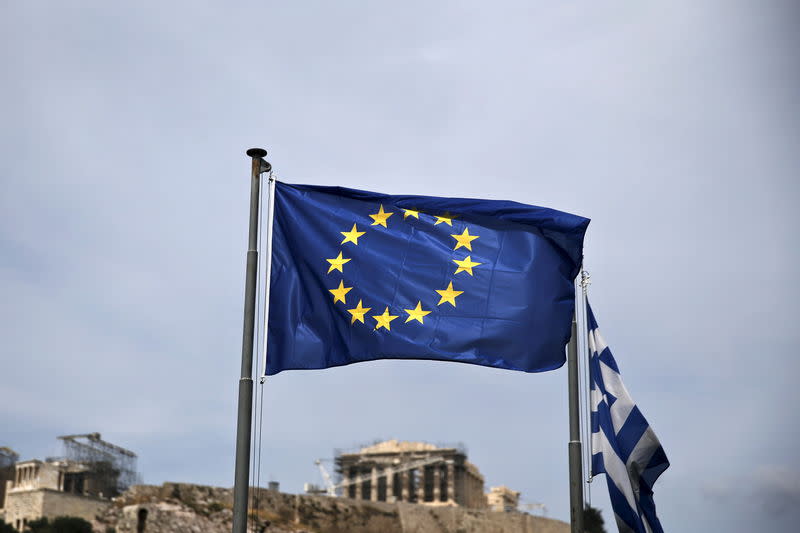 A European Union flag flutters as the ancient Parthenon temple is seen in the background in Athens June 1, 2015. REUTERS/Alkis Konstantinidis