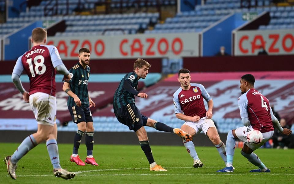 Patrick Bamford (C) of Leeds United scores the 2-0 lead during the English Premier League soccer match between Aston Villa and Leeds United in Birmingham - Laurence Griffiths/POOL/EPA-EFE/Shutterstock