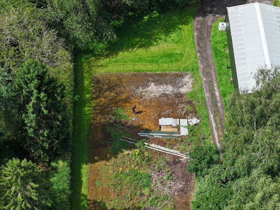 DJI Air 3 aerial photo of rural farmland on a sunny day with the 70mm telephoto camera