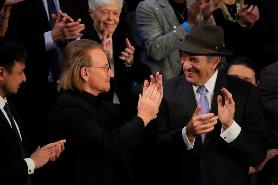 Paul Pelosi, right, is recognized by President Joe Biden during the State of the Union address from the House chamber of the United States Capitol in Washington. 