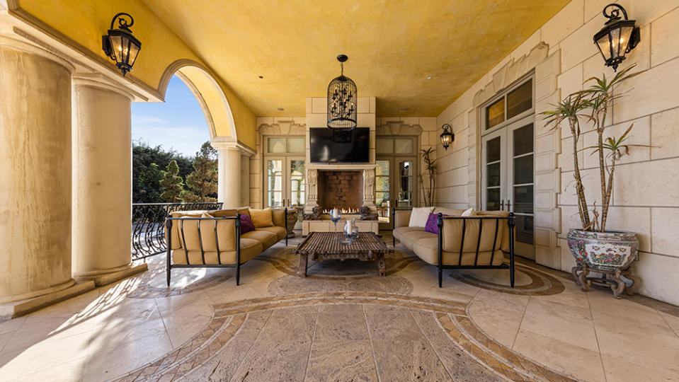 An outdoor space with fireplace - Credit: Joe Bryant