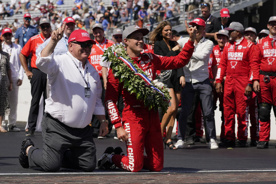 Car owner Chip Ganassi, left, and Marcus Ericsson, of Sweden, celebrate after Ericsson won the Indianapolis 500 auto race at Indianapolis Motor Speedway, Sunday, May 29, 2022, in Indianapolis. (AP Photo/Darron Cummings)