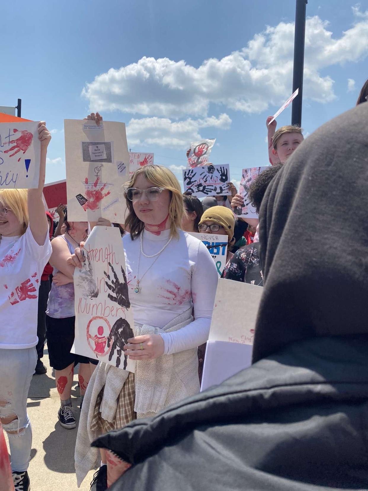 Students at Port Huron High School walkout of classes in support of sexual assault policy reform on June 9, 2023.