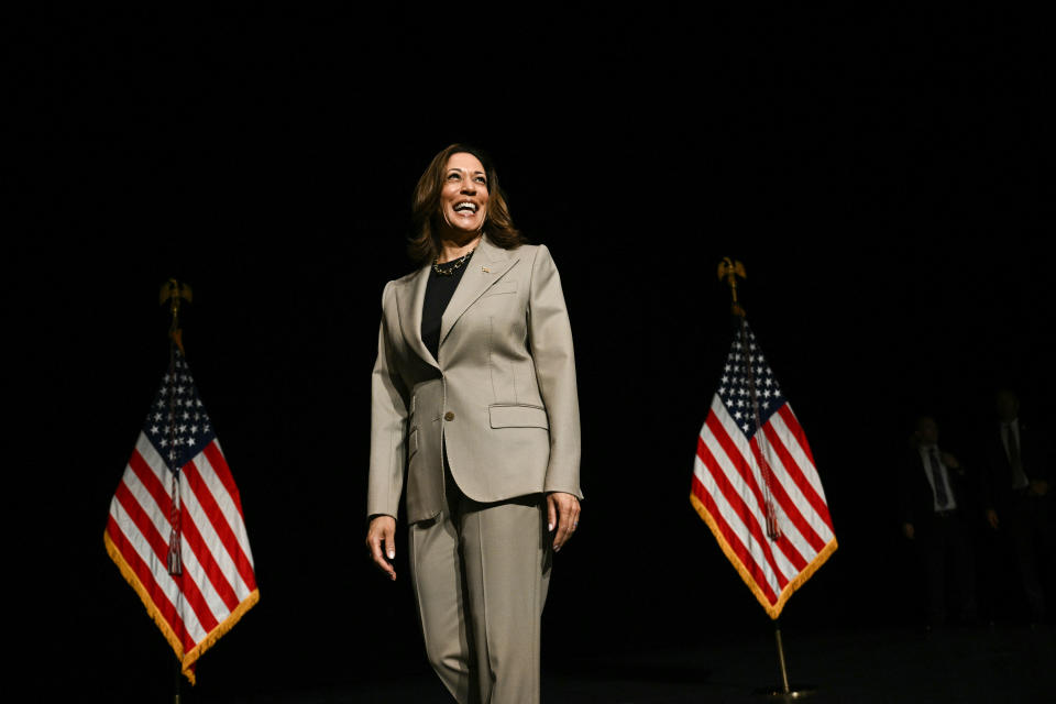 TOPSHOT - U.S. Vice President and Democratic presidential candidate Kamala Harris takes the stage in the Overflow Room after delivering a speech at Prince George's Community College in Largo, Maryland, August 15, 2024. (Photo by Brendan SMIALOWSKI / AFP) (Photo by BRENDAN SMIALOWSKI/AFP via Getty Images)