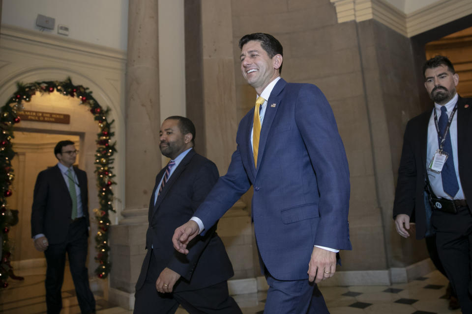 House Speaker Paul Ryan walks to the chamber as a revised spending bill is introduced that includes $5 billion demanded by President Donald Trump for a wall along the U.S.-Mexico border, as Congress tries to avert a partial shutdown, in Washington, Thursday, Dec. 20, 2018. (AP Photo/J. Scott Applewhite)