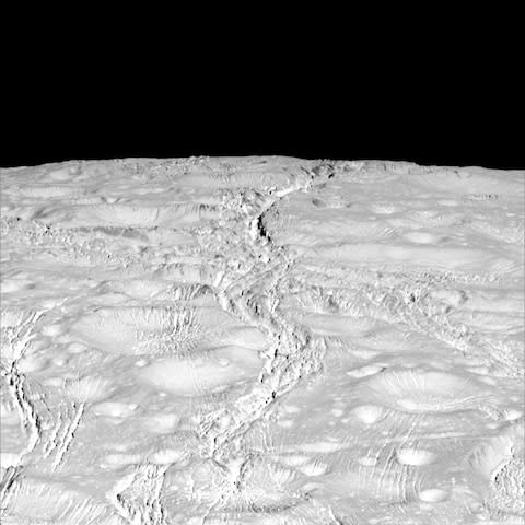 The north pole of Saturn's icy moon Enceladus is seen in an image from the Cassini spacecraft - Credit: NASA