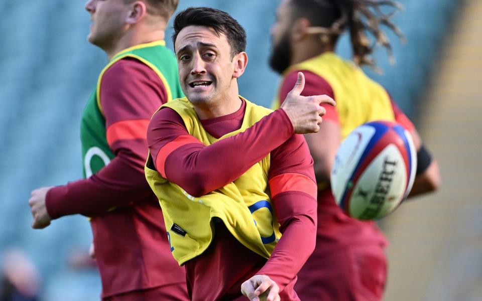 Alex Mitchell of England releases a pass during a training session at Twickenham