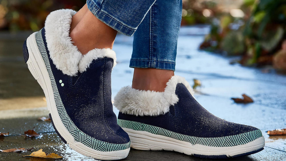 Ease your feet into a pair of Ryka water-repellant suede and faux fur slip-ons for seasonal comfort through the winter months.